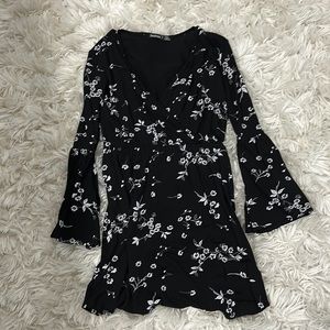 Black dress with wire flower detail